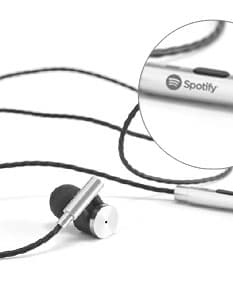 Fones de Ouvido Vibration c/ Microfone em estilo moderno e design metálico. Dispositivo eletrônico para comunicação e entretenimento, perfeito para uso no escritório, em casa ou no supermercado. Cor preta e prateada, com fio metálico e conexão. Ideal para ouvir música e atender chamadas com conforto e qualidade de som.